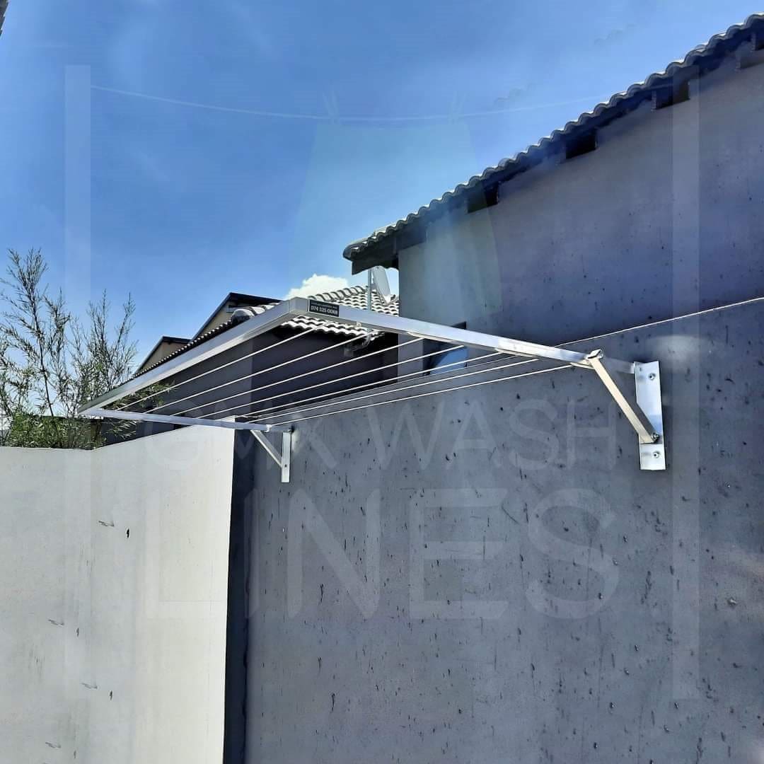 Rust-free Wall Mounted Washing Line on a sunny day.